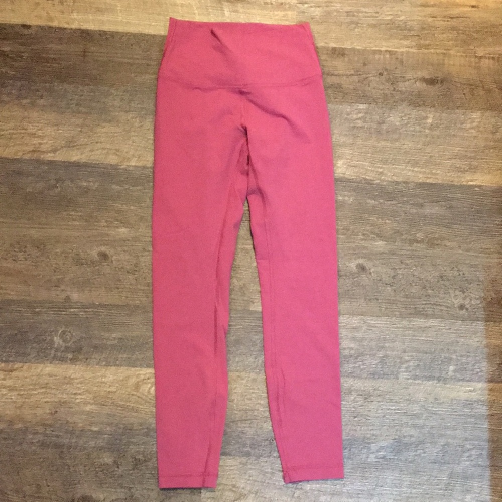 Lululemon winder under leggings pink size 4 25”